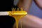 Melted depilatory wax. Sugaring wax. The girl removes her hair.