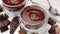 Melted hot chocolate in a bowl, close-up, rotation.