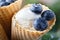 Melted ice cream in a bucket of blueberry.