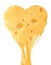 Melted piece of cheese in the shape of a heart on a white isolated background