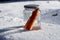 Melted snowman in winter waiting for the new winter season in the jar as a fresh carrot