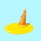 Melted yellow fruit ice cream in a waffle horn on a light blue background. Summer mood. Creative concept