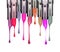 Melting colored lipsticks with falling drops down close-up