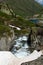 The melting glacier and snow of the mountain peaks