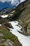 The melting glacier and snow of the mountain peaks