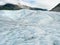 Melting ice relieves sweeping layers of glacier ice