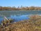 Melting ice on the rural pond in the springtime.