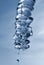 Melting icicle and drop of water