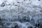 Melting snow with ice hummocks background. Spring background. Nature winter landscape.