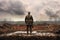 A member of Red Star military history club wears historical German uniform during historical reenactment. A soldier standing alone