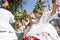 Members of Candomble religion dancing together and dressed in traditional clothes