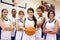 Members Of Female High School Basketball Team With Coach