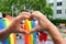 Members of LGBTq movement, Gay pride parade in city with rainbow flags, demonstration of people, mass march of lesbian, gay,
