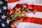 Memorial day, carnation flowers on american flag background