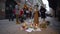 Memorial, people sorrow near flowers and candles in memory of those killed by the terrorist attack