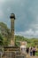 Memorial pillar containing skull of Keppetipola Disawe at open park in front of Temple of the Tooth,