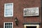 A memorial plaque above the entrance to the museum in Naarden