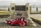 Memorial wreaths at the Normandy Landings memorial erected in Warsash in Hampshire England which was a departure point for the All