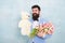 Memorize this moment. womens day. Formal mature businessman spring bouquet. 8 of march. bearded man in bow tie with