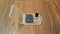 Memory card or Micro Sd card and adapter with case on wooden background