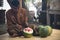 Men in Bali carving watermelon