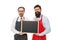 Men bearded bartender or cook in apron hold blank chalkboard. Bartender with blackboard. Hipster bartender show