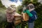 Men Beekeeping Collecting Honey with Masks