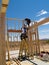 Men Building Frame for House - Vertical