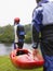 Men Carrying Kayak To River