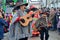 Men dressed as mexican musicians in ponchos and sombreros playing guitars at traditional Pereberia means`change clothes` carniva