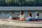 Men driving speed boat enjoying sunshine