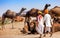 Men in ethnic attire attends the Pushkar fair in Rajasthan, India.