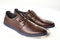 Men fashion brown shoe leather over white background. Pair casual stylish footwear