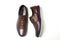 Men fashion brown shoe leather over white background. Pair casual stylish footwear