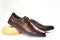 Men fashion brown shoe leather over white background. Pair casual stylish footwear