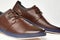 Men fashion brown shoe leather over white background. Pair casual stylish footwear