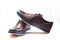 Men fashion brown shoe leather over white background. Pair casual stylish footwear