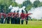 Men Firing Muskets during Reenactment