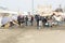 Men fishermen, carrying boxes with fish and equipment, Essaouira, Morocco