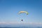 Men Flying in Paragliders in Blue Sky on a Sunny Day