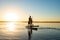 Men, friends relax on a SUP boards