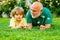 Men generation. Happy child with Grandfather playing outdoors. Child with Grandfather dreams in summer in nature