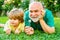 Men generation. Happy family Grandson hugs his grandpa on holiday. Grandpa retiree. Portrait of happy senior man father