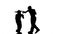 Men with a girl in helmets and boxing gloves beating in the ring . Silhouette. White background