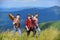 Men with guitar hiking on sunny day. Hiking with friends. Long route. Adventurers squad. Tourists hiking concept. Group