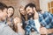 Men with hands clasped in arm wrestling challenge