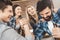 Men with hands clasped in arm wrestling challenge