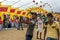 Men help to hold up a Japanese kite prior to take off on Negombo beach in Sri Lanka.