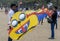 Men hold a kite on Negombo beach in Sri Lanka.