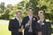 Men Holding Champagne Flutes At Wedding